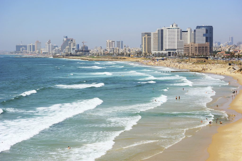 Sea coast and the view of Tel Aviv at the evening