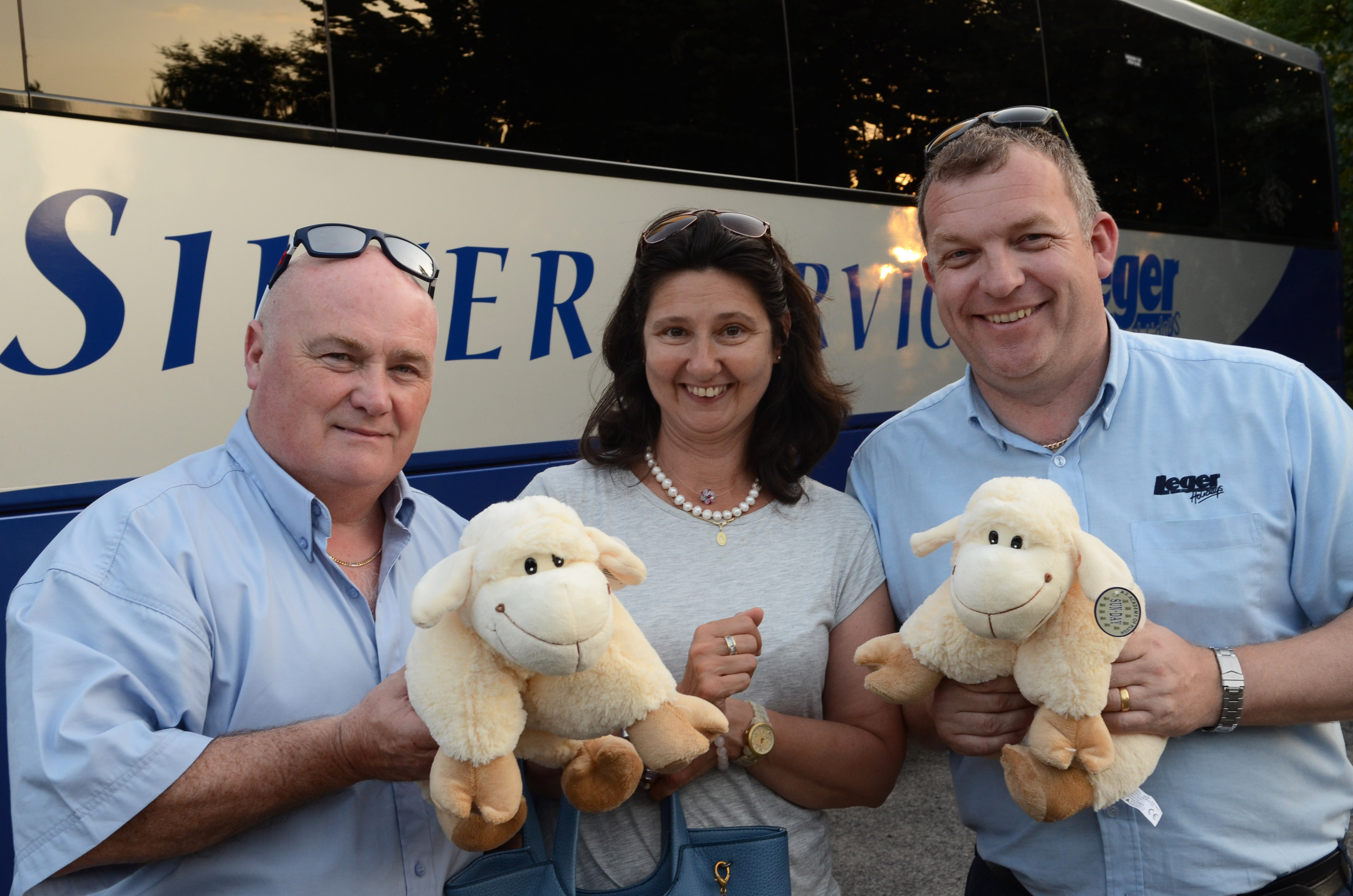 "Keiran and Mike present the Budapest guide with two cuddly sheep for her children"